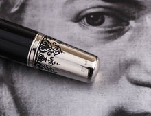Load image into Gallery viewer, Close up to the 750 gold hallmark engraved at the bottom of the pen.