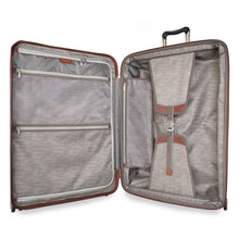 Load image into Gallery viewer, Interior view of the suitcase. It features a zipper-closing panel divider with pockets and adjustable straps.