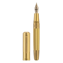 Load image into Gallery viewer, The Fountain pen version of the Goldfinger is shown with the cap set next to it.
