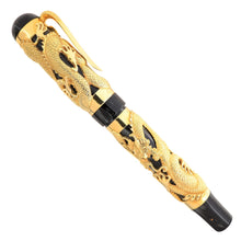 Load image into Gallery viewer, The Montegrappa 1995 Dragon fountain pen, capped, in gold overlay, featuring an intricate dragon design on a black marbled celluloid body, displayed on a white background.