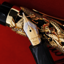 Load image into Gallery viewer, Close up to the fountain pen nib with engraved decorations, Montegrappa logo, ITALY, M