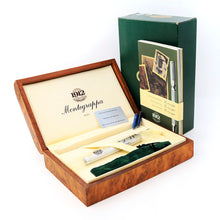 Load image into Gallery viewer, The Fountain Pen is shown with all its contents. It comes with the wooden presentation box, its outer green box, small information book, a card confirming the materials the pen was made of, the original plastic bag to hold the pen, the original ink cartridges, and the original green felt pen pouch.