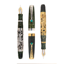 Load image into Gallery viewer, Uncapped Montegrappa Chinese Zodiac Rabbit fountain pens in gold and silver overlay, featuring intricate Rabbit engravings on green resin bodies, displayed on a white background.