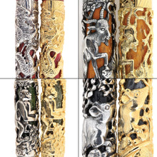 Load image into Gallery viewer, Close-up image of Montegrappa Chinese Zodiac fountain pens featuring intricate 3D engravings of zodiac animals in silver and gold finishes, including the dragon, goat, monkey, and rat designs.