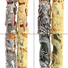 Load image into Gallery viewer, Close-up image of Montegrappa Chinese Zodiac fountain pens featuring intricate 3D engravings of zodiac animals in silver and gold finishes, including the ox, tiger, pig, and snake designs.