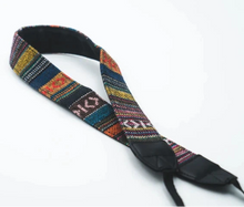 Load image into Gallery viewer, The folded strap with woven tapestry design on a white background.