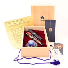 Load image into Gallery viewer, Fountain pen set with wooden box, pen, ink cartridge, documents, and accessories on a white background