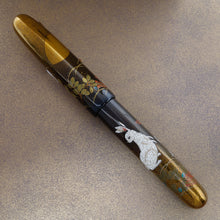 Load image into Gallery viewer, The image shows the Rabbit on Moonlight pen with it's cap on the barrel.