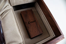 Load image into Gallery viewer, Close up to the opened compartment in the presentation box, featuring a wooden case for ink cartridges.