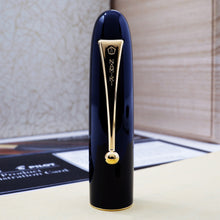 Load image into Gallery viewer, Close up to the cap of the fountain pen. The Namiki logo is engraved in it.