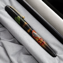 Load image into Gallery viewer, Side view of the fountain pen with the cap on.
