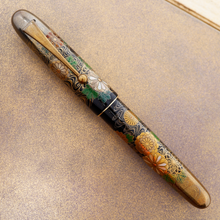 Load image into Gallery viewer, Front view of the Fountain Pen set on the lid of the outer box.