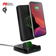 Load image into Gallery viewer, A cellphone being attached to the wireless charging dock.