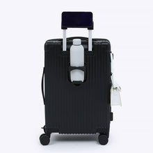 Load image into Gallery viewer, Back panel view of the black suitcase with a water bottle in the holder, a purse on the right hook and a phone on the handle.