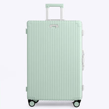 Load image into Gallery viewer, Front panel view of the light green suitcase with the telescopic handle extended.