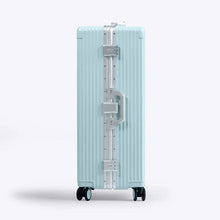 Load image into Gallery viewer, Side panel view of the powdered blue suitcase. It features two three-digit combination TSA approved locks.