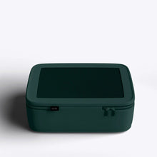 Load image into Gallery viewer, A green packing cube on a white background.
