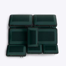 Load image into Gallery viewer, Set of green cases stacked on a white background