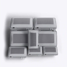 Load image into Gallery viewer, The pack of six silver packing cases arranged in a white background