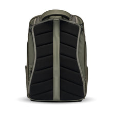 Load image into Gallery viewer, Back view of the olive green backpack. The shoulder straps are tucked behind the padded panel.