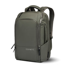 Load image into Gallery viewer, Angled front view of the olive green backpack with the shoulder straps lifted.