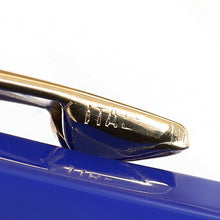 Load image into Gallery viewer, Close up to the side of the clip with faded engraving: ITALY.