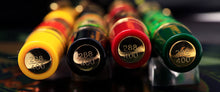 Load image into Gallery viewer, Close up to the bottom of the four pens, showing the engraved matching edition number, 288 of 400.