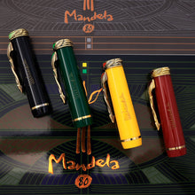 Load image into Gallery viewer, Side view of the four fountain pen caps with the engraved Mandela signature