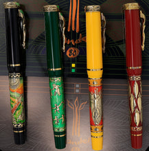 Load image into Gallery viewer, Side view of the green and black, green, yellow and orange, and red fountain pens with golden accents.