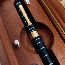 Load image into Gallery viewer, Close up to the fountain pen in the presentation box slot.