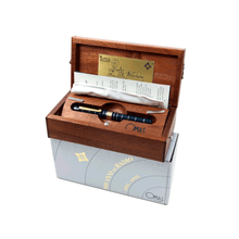 Load image into Gallery viewer, The pen arranged in the presentation box with the outer box and included pen sleeve and pamphlets.