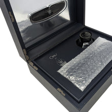 Load image into Gallery viewer, Angled interior view of the presentation box. Due to age, some of the edges have deteriorated.