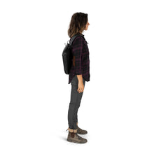 Load image into Gallery viewer, Side view of a young woman carrying the sling bag.
