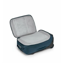 Load image into Gallery viewer, Interior view of the blue suitcase's front pocket. It features zipper-closing compartments.