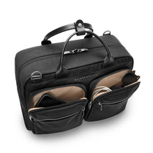 Load image into Gallery viewer, Briggs & Riley Rhapsody Multi-Pocket Cabin Bag shown in Black
Front Angled View, showing two front zip pockets to hold business essentials. Ideal for a smart phone, charger cables, sunglasses, etc.
Dimensions: 10.5 x 16.75 x 8.75 in / 26.7 x 42.5 x 22.2 cm