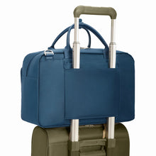 Load image into Gallery viewer, Briggs & Riley Rhapsody Multi-Pocket Cabin Bag shown in Navy
Back Panel Attachment Feature allows this cabin bag to ride along the telescoping handles of your cabin trolley bag.
Dimensions: 10.5 x 16.75 x 8.75 in / 26.7 x 42.5 x 22.2 cm