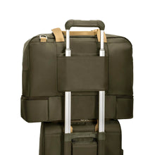 Load image into Gallery viewer, Briggs & Riley Rhapsody Weekender Tote - Shown in Olive
Image of Attachment Feature, allowing this bag to ride along the telescoping handles of your carry-on trolley bag.
Dimensions:  15 x 19 x 9.8 in / 38.1 x 48.3 x 24.9 cm