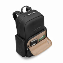 Load image into Gallery viewer, Briggs & Riley Rhapsody Medium Backpack - Shown in Black
Front Panel Angled View with Front Zip Organizer Pocket shown open. This pocket is ideal for quick access to passport, airline ticket, charger cables, smart phone, etc.
Dimensions: 16 x 13.5 x 6 in / 40.6 x 34.3 x 15.2 cm