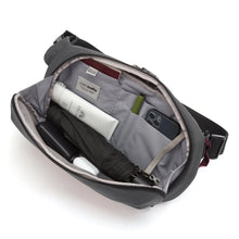 Load image into Gallery viewer, Interior view of the bag with accessories organized in the compartments.