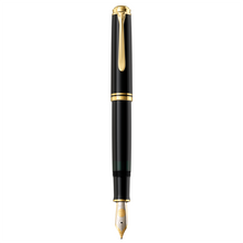 Load image into Gallery viewer, The black and gold fountain pen on a white background.