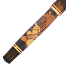 Load image into Gallery viewer, Close up pf the pen barrel with gold and brown cloud design on a white background.