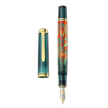 Load image into Gallery viewer, Front view of the fountain pen with the cap next to it.