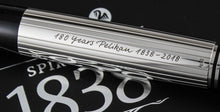 Load image into Gallery viewer, Close up on the pen barrel with engraved text: 180 Years Pelikan 1938-2018, Ag 925