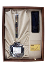Load image into Gallery viewer, The Jurojin fountain pen arranged in the presentation box with the ink bottle and pen case.