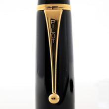 Load image into Gallery viewer, Close up to the clip on the cap. The word PILOT is engraved.