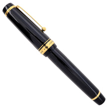 Load image into Gallery viewer, Side view of the fountain pen with the cap on.