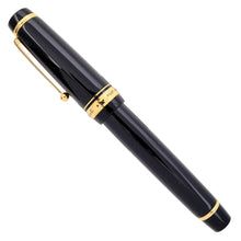 Load image into Gallery viewer, Side view of the fountain pen with the cap on.