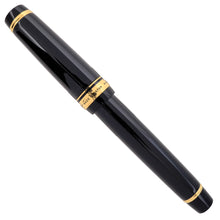 Load image into Gallery viewer, Back view of the fountain pen with the cap on.