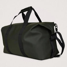 Load image into Gallery viewer, Angled front panel view of the green bag.