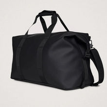 Load image into Gallery viewer, Angled view of the black duffle bag.